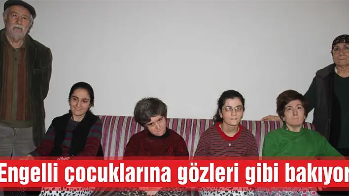 Engelli çocuklarına gözleri gibi bakıyor