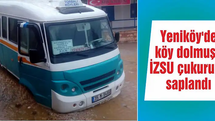 Yeniköy'de köy dolmuşu İZSU çukuruna saplandı